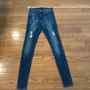 Flying Monkey Skinny Jeans in Dark Blue with Distressed Accents